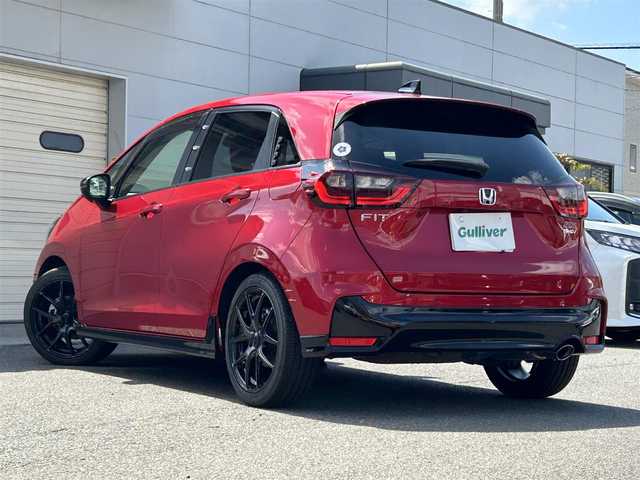 ホンダ フィット e:HEV RS 奈良県 2024(令6)年 0.9万km プレミアムクリスタルレッドM 純正エアロ/ハーフレザー/社外AW（純正積込）/追従式クルコン/Bluetooth/ETC2.0/フルセグTV/ブレーキホールド/パドルシフト/バックカメラ/パドルシフト/スマートキー/UAB付/純正スタートスイッチカバー/プッシュスタート/取扱説明書