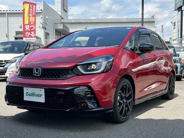 ホンダ フィット e:HEV RS 奈良県 2024(令6)年 0.9万km プレミアムクリスタルレッドM 純正エアロ/ハーフレザー/社外AW（純正積込）/追従式クルコン/Bluetooth/ETC2.0/フルセグTV/ブレーキホールド/パドルシフト/バックカメラ/パドルシフト/スマートキー/UAB付/純正スタートスイッチカバー/プッシュスタート/取扱説明書