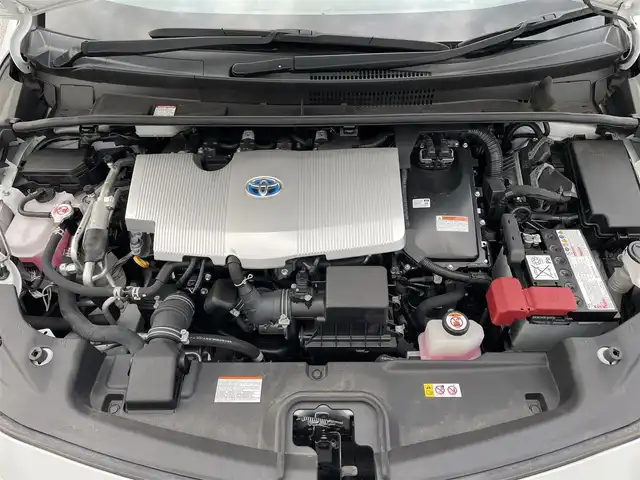 トヨタ プリウス ＰＨＶ A プレミアム 滋賀県 2021(令3)年 5.2万km プラチナホワイトパールマイカ ワンオーナー/モデリスタエアロ/モデリスタ1８インチAW/純正８型ディスプレイ/・Bluetooth/ミラキャスト/パノラミックビューモニター/ステアリングリモコン/AC100V/パーキングアシスト/ETC/前方ドライブレコーダー/レーダクルーズコントロール/置くだけスマホ充電/運転席パワーシート/前席シートヒーター/ベンチレーション/トヨタセーフティセンス/・レーントレーシングアシスト/・プリクラッシュセーフティ/・パーキングサポートブレーキ/・ブラインドスポットモニター/・ロードサインアシスト/・先行車発進お知らせ/ヘッドアップディスプレイ/LEDオートライト/フォグライト/オートハイビーム/充電ケーブル/インテリアイルミネーション/ドライブサポートイルミネーション/スマートキー