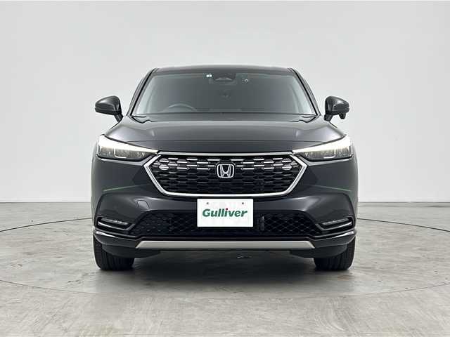 ホンダ ヴェゼル ハイブリッド e:HEV Z 三重県 2022(令4)年 2.8万km クリスタルブラックパール ９インチプレミアムインターナビ/（フルセグＴＶ ＤＶＤ ＢＴ）/OPフロントグリル/バックカメラ/ホンダセンシング/レーンキープアシスト/ブラインドスポットモニター/ハンズフリーアクセスパワーテールゲート/シートヒーター （前席）/ステアリングヒーター/コーナーセンサー/レーダークルーズコントロール/ビルトインETC/電子パーキング/パドルシフト/スペアキー×1
