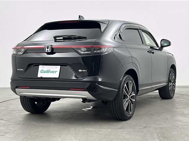 ホンダ ヴェゼル ハイブリッド e:HEV Z 三重県 2022(令4)年 2.8万km クリスタルブラックパール ９インチプレミアムインターナビ/（フルセグＴＶ ＤＶＤ ＢＴ）/OPフロントグリル/バックカメラ/ホンダセンシング/レーンキープアシスト/ブラインドスポットモニター/ハンズフリーアクセスパワーテールゲート/シートヒーター （前席）/ステアリングヒーター/コーナーセンサー/レーダークルーズコントロール/ビルトインETC/電子パーキング/パドルシフト/スペアキー×1