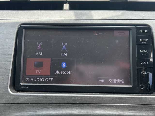 トヨタ プリウス L 沖縄県 2014(平26)年 10万km ブラック 禁煙車　/純正ナビ　ワンセグＴＶ　Ｂｌｕｅｔｏｏｔｈ　/バックカメラ　/オートライト　/ビルトインＥＴＣ　/ステアリングスイッチ　/ウインカードアミラー　/横滑り防止装置　/スマートキー