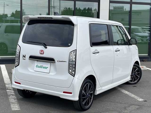 ホンダ Ｎ ＷＧＮ カスタム Lターボ 道東・釧路十勝 2023(令5)年 1.1万km プラチナホワイトパール ・４WD/・純正メモリナビ/（CD・DVD・AM・FM・BT・USB・フルセグ）/・バックカメラ/・ETC/・純正エンジンスターター/・パドルシフト/・レーダークルーズコントロール/・前席シートヒーター/・ヒーテッドドアミラー/・横滑り防止装置/・白線逸脱防止機能/・衝突被害軽減ブレーキ/・レザーシート/・純正フロアマット/・スマートキー/・プッシュスタート/・保証書/・取扱説明書/・社外アルミ付冬タイヤ積込/（155/65/14　2020年製 ５ｍｍ）