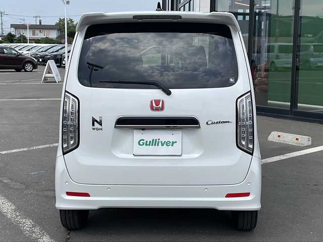 ホンダ Ｎ ＷＧＮ カスタム Lターボ 道東・釧路十勝 2023(令5)年 1.1万km プラチナホワイトパール ・４WD/・純正メモリナビ/（CD・DVD・AM・FM・BT・USB・フルセグ）/・バックカメラ/・ETC/・純正エンジンスターター/・パドルシフト/・レーダークルーズコントロール/・前席シートヒーター/・ヒーテッドドアミラー/・横滑り防止装置/・白線逸脱防止機能/・衝突被害軽減ブレーキ/・レザーシート/・純正フロアマット/・スマートキー/・プッシュスタート/・保証書/・取扱説明書/・社外アルミ付冬タイヤ積込/（155/65/14　2020年製 ５ｍｍ）