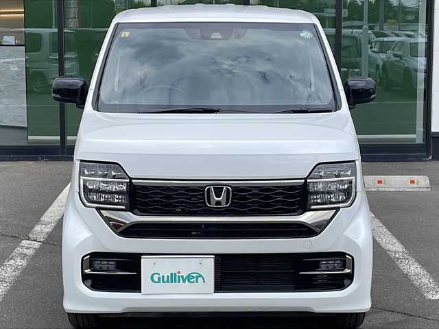 ホンダ Ｎ ＷＧＮ カスタム Lターボ 道東・釧路十勝 2023(令5)年 1.1万km プラチナホワイトパール ・４WD/・純正メモリナビ/（CD・DVD・AM・FM・BT・USB・フルセグ）/・バックカメラ/・ETC/・純正エンジンスターター/・パドルシフト/・レーダークルーズコントロール/・前席シートヒーター/・ヒーテッドドアミラー/・横滑り防止装置/・白線逸脱防止機能/・衝突被害軽減ブレーキ/・レザーシート/・純正フロアマット/・スマートキー/・プッシュスタート/・保証書/・取扱説明書/・社外アルミ付冬タイヤ積込/（155/65/14　2020年製 ５ｍｍ）