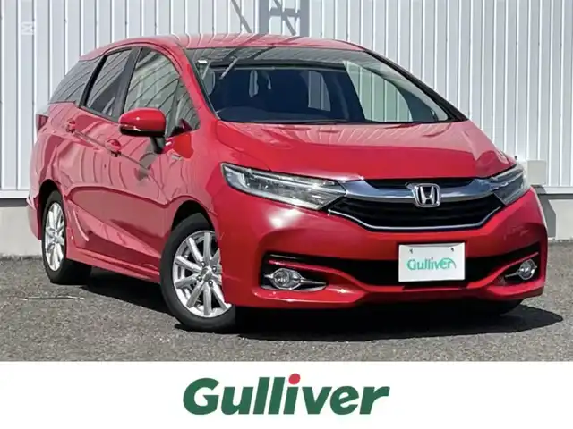 ホンダ シャトル ハイブリッド X スタイルエディション 熊本県 2016(平28)年 6.1万km ミラノレッド 純正ナビ/・AM/FM/CD/DVD/BT/SD/・フルセグTV/・バックカメラ/・HDMI/あんしんパッケージ/・シティブレーキアクティブシステム/・サイドカーテンエアバッグシステム/・前席用i-サイドエアバッグシステム/革巻きステアリング/・ステアリングスイッチ/・クルーズコントロール/・パドルシフト/走行モード（Sモード）/電動格納ミラー/ウィンカーミラー/社外アルミホイール（ジョーカー）/フォグライト/社外ドライブレコーダー（前後）