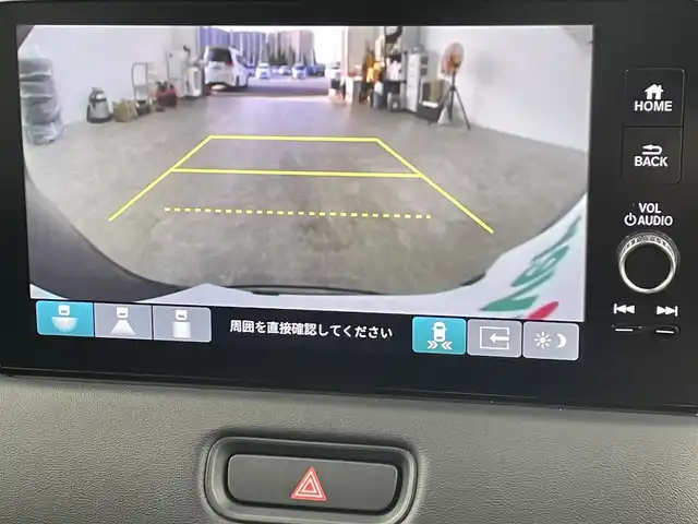 ホンダ ヴェゼル ハイブリッド e:HEV Z 千葉県 2024(令6)年 0.6万km クリスタルブラックパール ホンダセンシング（安全運転支援システム）/・衝突軽減ブレーキ/・誤発進抑制機能/・歩行者事故低減ステアリング/・路外逸脱抑制機能/・アダプティブクルーズコントロール/・車線維持支援システム/・先行車発進お知らせ機能/・標識認識機能/純正9インチナビ/・Bluetooth接続/・フルセグTV/・AppleCarPlay/AndroidAuto/ブラインドスポットモニター/前後コーナーセンサー/スマートキー/ETC2.0/ハーフレザーシート/シートヒーター/パドルシフト