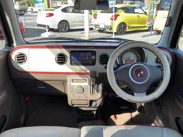 スズキ ラパン ショコラ X 山口県 2014(平26)年 8.9万km シャンパンピンクPM 純正ナビ/SD/BT/AUX/ワンセグTV/バックカメラ/ベージュツートン革シート/純正HIDヘッドライト/オートライト/革巻きステアリング/アイドリングストップ/スマートキー/純正フロアマット/純正ドアバイザー/ETC/電動格納ウインカードアミラー