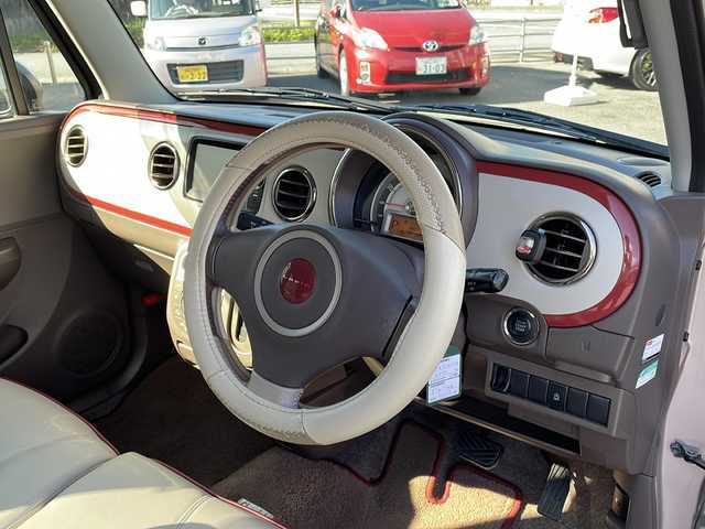 スズキ ラパン ショコラ X 山口県 2014(平26)年 8.9万km シャンパンピンクPM 純正ナビ/SD/BT/AUX/ワンセグTV/バックカメラ/ベージュツートン革シート/純正HIDヘッドライト/オートライト/革巻きステアリング/アイドリングストップ/スマートキー/純正フロアマット/純正ドアバイザー/ETC/電動格納ウインカードアミラー