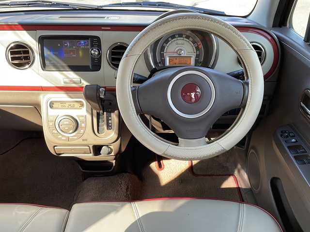 スズキ ラパン ショコラ X 山口県 2014(平26)年 8.9万km シャンパンピンクPM 純正ナビ/SD/BT/AUX/ワンセグTV/バックカメラ/ベージュツートン革シート/純正HIDヘッドライト/オートライト/革巻きステアリング/アイドリングストップ/スマートキー/純正フロアマット/純正ドアバイザー/ETC/電動格納ウインカードアミラー