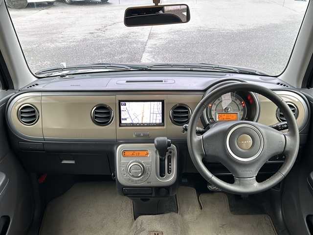 スズキ ラパン X セレクション 愛知県 2013(平25)年 7万km アーバンブラウンパールメタリック 社外ナビ/ワンセグＴＶ/・ＣＤ/・ＳＤ　/シートヒーター/純正アルミホイール　/純正フロアマット　/革巻きステアリング　/ヘッドライトレベライザー　/プッシュスタート　/アイドリングストップ