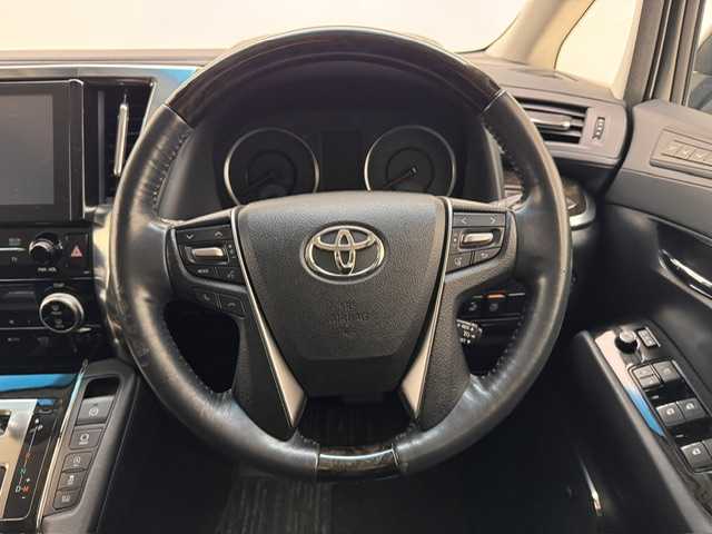 トヨタ ヴェルファイア Z Gエディション 兵庫県 2015(平27)年 9.7万km ブラック 純正ナビ/フルセグ CD DVD BT MSV USB AUX/JBLプレミアムサウンド/純正フリップダウンモニター/クルーズコントロール/クリアランスソナー/パーキングアシスト/パワーバックドア/ビルトインETC2.0/両側パワースライドドア/LEDヘッドライト/オートライト/フォグライト/ハーフレザーシート/パワーシート/オットマン/電子パーキング/HOLD/純正ドアバイザー/スマートキー