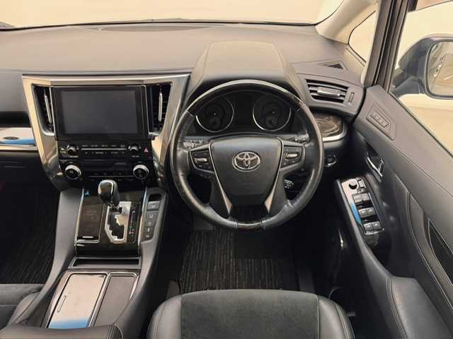 トヨタ ヴェルファイア Z Gエディション 兵庫県 2015(平27)年 9.7万km ブラック 純正ナビ/フルセグ CD DVD BT MSV USB AUX/JBLプレミアムサウンド/純正フリップダウンモニター/クルーズコントロール/クリアランスソナー/パーキングアシスト/パワーバックドア/ビルトインETC2.0/両側パワースライドドア/LEDヘッドライト/オートライト/フォグライト/ハーフレザーシート/パワーシート/オットマン/電子パーキング/HOLD/純正ドアバイザー/スマートキー