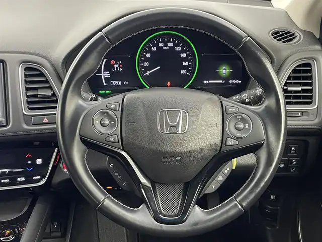 ホンダ ヴェゼル ハイブリッド Z ホンダセンシング 大分県 2020(令2)年 1.9万km ルーセブラックM 純正SDナビ/（フルセグ/Bluetooth/CD/DVD)/ホンダセンシング/レーダークルーズコントロール/オートハイビーム/車線逸脱抑制機能/ビルトインETC/ハーフレザーシート/前席シートヒーター/バックカメラ/オートライト/ステアリングスイッチ/純正アルミホイール/プッシュスタート・スマートキー