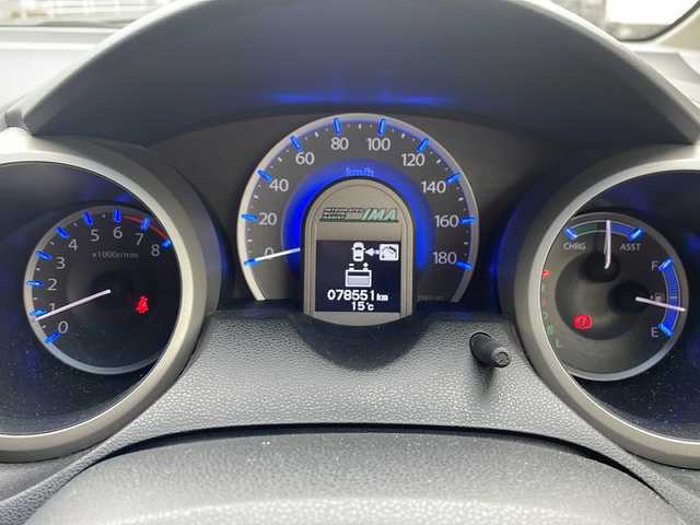 ホンダ フィット ハイブリット 10thアニバーサリー 鳥取県 2012(平24)年 7.9万km プレミアムホワイトパール ＨＤＤナビ/フルセグＴＶ　ＭＳＶ　ＤＶＤ　ＣＤ　ＳＤ　Ｂｌｕｅｔｏｏｔｈ/ＥＴＣ/クルーズコントロール/スマートキー/スペアキー/フロアマット/ドアバイザー/ライトレベライザー/新車保証書/取扱説明書