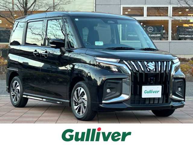 スズキ ソリオ バンディット HV MV 福島県 2025(令7)年 0.1千km スーパーブラックパール デュアルセンサーブレーキサポート/・スズキコネクト対応通信機装着車/・アダプティブクルーズコントロール/・車線維持支援機能/純正メモリナビゲーション/（AM/FM/Bluetooth/CarPlay/フルセグTV）/全方位カメラ/ヘッドアップディスプレイ/両側パワースライドドア/前後ソナーセンサー/LEDヘッドライト/・オートライト/・フォグランプ/スマートキー/・プッシュスタート/・スペアキー/前席シートヒーター/オートホールド/アイドリングストップ