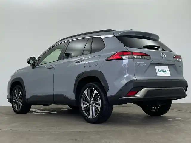 トヨタ カローラ クロス ハイブリッド Z 鹿児島県 2024(令6)年 1.3万km セメントグレーメタリック 純正10.5インチオーディオディスプレイ（ナビ機能あり）/全方位カメラ/トヨタセーフティセンス/・プリクラッシュセーフティー/・レーントレーシングアシスト/・レーンディパーチャーアラート/・レーダークルーズコントロール/・発進遅れ告知機能/・オートマチックハイビーム/ブラインドスポットモニター/前後コーナーセンサー/パノラマルーフ/パワーシート/シートヒーター/純正ビルトインETC2.0/純正18インチアルミホイール/純正フロアマット/LEDヘッドライト/フォグランプ/Bluetooth、CD/フルセグTV