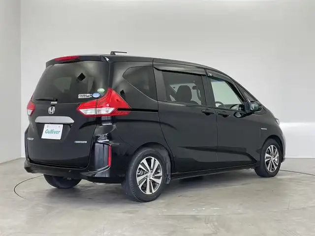 ホンダ フリード ハイブリット G ホンダセンシング 埼玉県 2020(令2)年 2.8万km クリスタルブラックパール 純正９インチナビ　バックカメラ　ホンダセンシング　アダクティブクルーズコントロール　衝突軽減　ＥＴＣ　ドライブレコーダー　両側パワースライドドア　純正アルミホイール　オートライト　地デジＴＶ