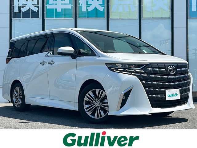トヨタ アルファード Z 山形県 2023(令5)年 1.2万km プラチナホワイトパールマイカ ４WD/トヨタセーフティセンス/・プリクラッシュブレーキ/・レーダークルーズコントロール/・レーントレーシングアシスト/・ロードサインアシスト/・プロアクティブドライビングアシスト/・レーンチェンジアシスト/・フロントクロストラフィックアラート/ブラインドスポットモニター/前後コーナーセンサー/パノラミックビューモニター/トヨタチームメイト/デジタルインナーミラー/ヘッドアップディスプレイ/純正ナビ/（Bluetooth/AM/FM/フルセグ/USB)/テレビキャンセラー/ステアリングスイッチ/ステアリングヒーター/両側パワースライドドア/ビルトインETC/置くだけ充電/純正エンジンスターター/オートマチックハイビーム/レザーシート/メモリー付きシート/前席・2列目パワーシート/前席・2列目シートヒーター・エアシート/キャプテンシート/後席LEDドームランプ/後席左右独立ムーンルーフ/パワーバックドア/LEDヘッドライト/純正アルミホイール