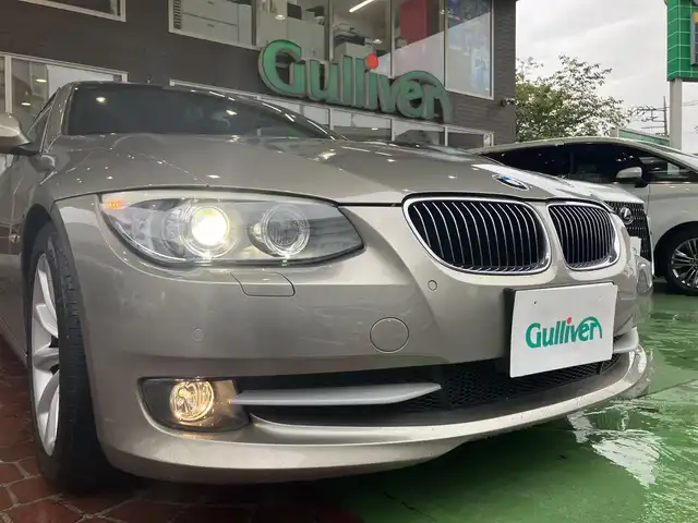 ＢＭＷ ３３５ｉ カブリオレ 神奈川県 2010(平22)年 3.6万km プラチナブロンズ 電動オープン/新車時保証書/取扱説明書/前後クリアランスソナー/HIDヘッドライト/純正ナビ/（DVD/TV/CD/FM/AM)/純正アルミホイール/前席パワーシート/前席シートヒーター