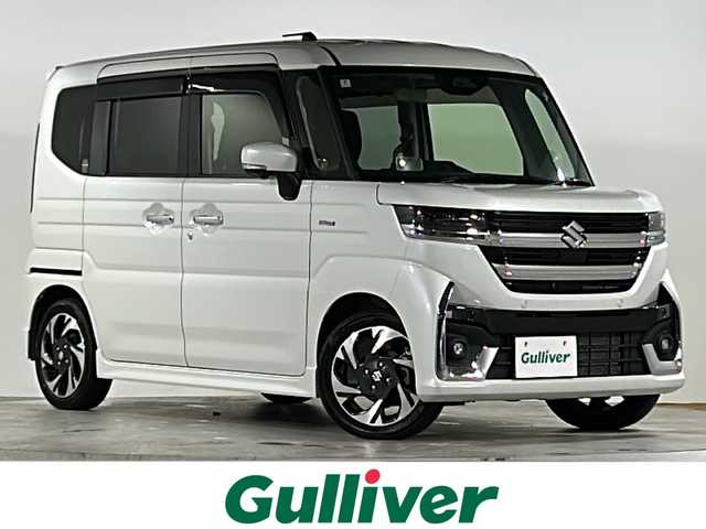 スズキ スペーシア カスタム HYBRID XS ターボ 広島県 2024(令6)年 1.3万km ピュアホワイトP 禁煙車/4WD/インタークーラーターボ/スズキセーフティサポート/・デュアルセンサーブレーキサポートII/・先行車発進お知らせ/・標識認識機能/・ヘッドアップディスプレイ/・誤発進抑制機能/・ハイビームアシスト/・アダプティブクルーズコントロール/・車線維持支援機能/・車線逸脱抑制/・車線逸脱警報/・ふらつき警報/コーナーセンサー/全方位モニター付９型メモリーナビ/・フルセグ/Bluetooｔｈ/ＵＳＢ/スマホ連携/スズキコネクト対応通信機装着車/両側パワースライドドア/革巻きステアリング/ステアリングスイッチ/ステアリングヒーター/パドルシフト/オートライト/電動パーキングブレーキ/ブレーキホールド/LEDヘッドライト/フォグランプ/ハーフレザーシート/シートヒーター/リアサーキュレーター/アイドリングストップ/スマートキー/プッシュスタート/スペアキー/純正15インチアルミホイール