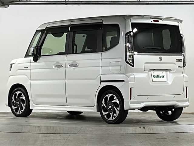 スズキ スペーシア カスタム HYBRID XS ターボ 広島県 2024(令6)年 1.3万km ピュアホワイトP 禁煙車/4WD/インタークーラーターボ/スズキセーフティサポート/・デュアルセンサーブレーキサポートII/・先行車発進お知らせ/・標識認識機能/・ヘッドアップディスプレイ/・誤発進抑制機能/・ハイビームアシスト/・アダプティブクルーズコントロール/・車線維持支援機能/・車線逸脱抑制/・車線逸脱警報/・ふらつき警報/コーナーセンサー/全方位モニター付９型メモリーナビ/・フルセグ/Bluetooｔｈ/ＵＳＢ/スマホ連携/スズキコネクト対応通信機装着車/両側パワースライドドア/革巻きステアリング/ステアリングスイッチ/ステアリングヒーター/パドルシフト/オートライト/電動パーキングブレーキ/ブレーキホールド/LEDヘッドライト/フォグランプ/ハーフレザーシート/シートヒーター/リアサーキュレーター/アイドリングストップ/スマートキー/プッシュスタート/スペアキー/純正15インチアルミホイール
