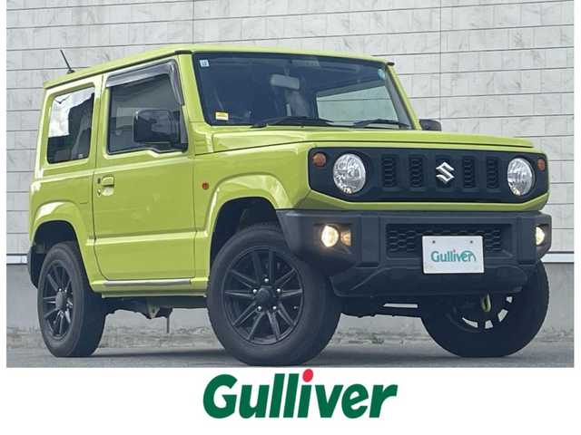 スズキ ジムニー XL 鹿児島県 2019(令1)年 6.6万km キネティックイエロー 5速MT　/リフトアップ（1インチ）/社外サスペンション（純正有り）/社外マフラー　/社外SDナビＣＮ－Ｅ３１０Ｄ　/(BT/CD/DVD/AM/FM)/バックカメラ　/前席シートヒーター　/フロントフォグライト/ドアミラーヒーター　/ＥＴＣ　/純正16インチアルミホイール　/フロアマット　/スマートキー　/スペアキー　/スペアタイヤ　/ダブルサイドカーテンエアＢ