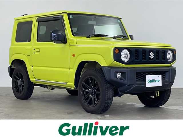 スズキ ジムニー XL 鹿児島県 2019(令1)年 6.6万km キネティックイエロー 5速MT　/リフトアップ（1インチ）/社外サスペンション（純正有り）/社外マフラー　/社外SDナビＣＮ－Ｅ３１０Ｄ　/(BT/CD/DVD/AM/FM)/バックカメラ　/前席シートヒーター　/フロントフォグライト/ドアミラーヒーター　/ＥＴＣ　/純正16インチアルミホイール　/フロアマット　/スマートキー　/スペアキー　/スペアタイヤ　/ダブルサイドカーテンエアＢ