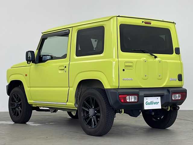 スズキ ジムニー XL 鹿児島県 2019(令1)年 6.6万km キネティックイエロー 5速MT　/リフトアップ（1インチ）/社外サスペンション（純正有り）/社外マフラー　/社外SDナビＣＮ－Ｅ３１０Ｄ　/(BT/CD/DVD/AM/FM)/バックカメラ　/前席シートヒーター　/フロントフォグライト/ドアミラーヒーター　/ＥＴＣ　/純正16インチアルミホイール　/フロアマット　/スマートキー　/スペアキー　/スペアタイヤ　/ダブルサイドカーテンエアＢ
