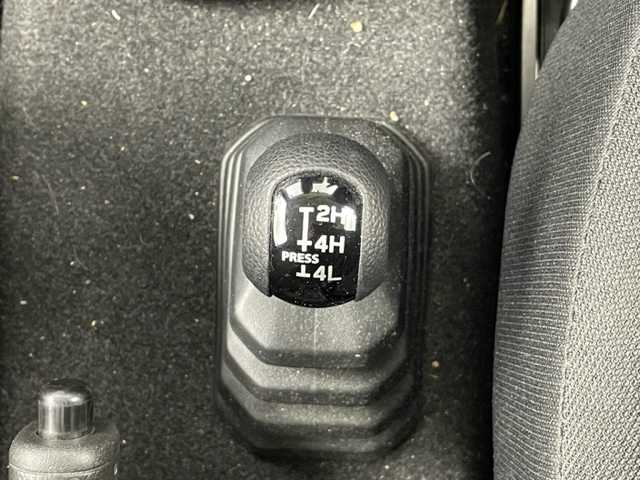 スズキ ジムニー XL 鹿児島県 2019(令1)年 6.6万km キネティックイエロー 5速MT　/リフトアップ（1インチ）/社外サスペンション（純正有り）/社外マフラー　/社外SDナビＣＮ－Ｅ３１０Ｄ　/(BT/CD/DVD/AM/FM)/バックカメラ　/前席シートヒーター　/フロントフォグライト/ドアミラーヒーター　/ＥＴＣ　/純正16インチアルミホイール　/フロアマット　/スマートキー　/スペアキー　/スペアタイヤ　/ダブルサイドカーテンエアＢ