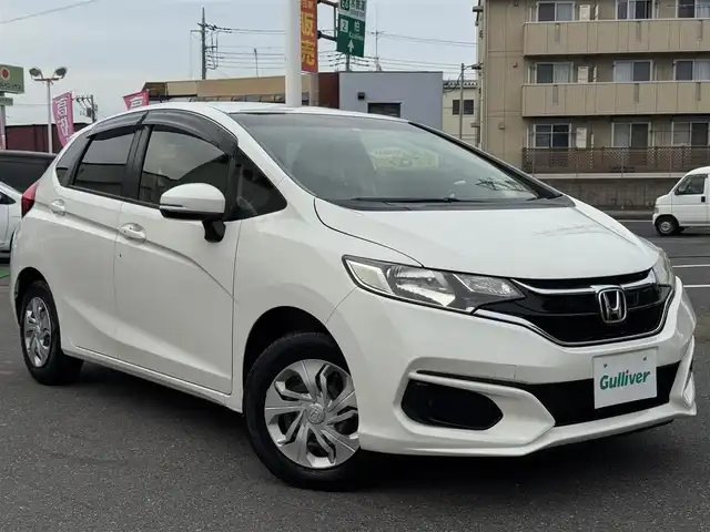 ホンダ フィット 13G F 千葉県 2017(平29)年 6.2万km タフホワイトⅡ 社外メモリーナビ/ワンセグTV/CD/DVD/ハロゲンヘッドライト/革巻きステアリング/社外フロアマット/スマートキー/ETC/保証書・取説