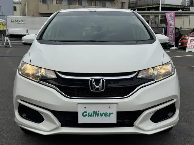 ホンダ フィット 13G F 千葉県 2017(平29)年 6.2万km タフホワイトⅡ 社外メモリーナビ/ワンセグTV/CD/DVD/ハロゲンヘッドライト/革巻きステアリング/社外フロアマット/スマートキー/ETC/保証書・取説