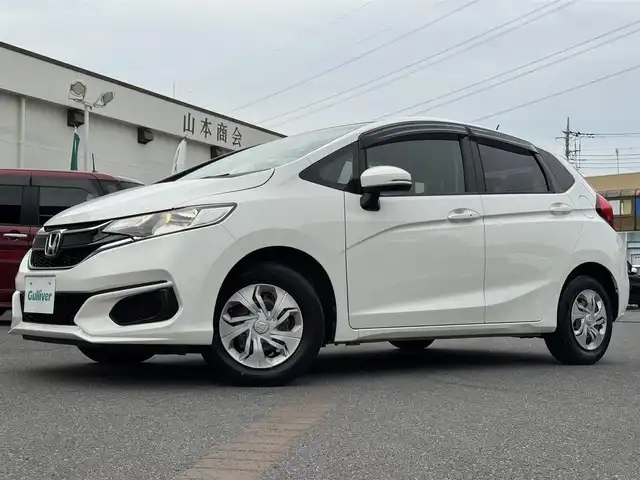 ホンダ フィット 13G F 千葉県 2017(平29)年 6.2万km タフホワイトⅡ 社外メモリーナビ/ワンセグTV/CD/DVD/ハロゲンヘッドライト/革巻きステアリング/社外フロアマット/スマートキー/ETC/保証書・取説