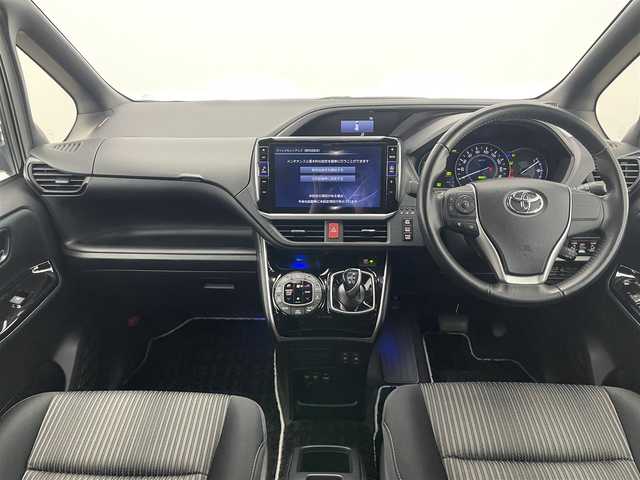トヨタ ヴォクシー ハイブリッド ZS 煌 愛知県 2018(平30)年 2.6万km ブラック アルパイン１１型ナビ　フルセグＴＶ　ＨＤＭＩ　ＵＳＢ　アルパイン１２．８型後席モニター　シートヒーター　両側パワスラ　コーナーセンサー　セーフティセンス　衝突軽減　クルコン　ＬＥＤオートライト　フォグランプ　禁煙車