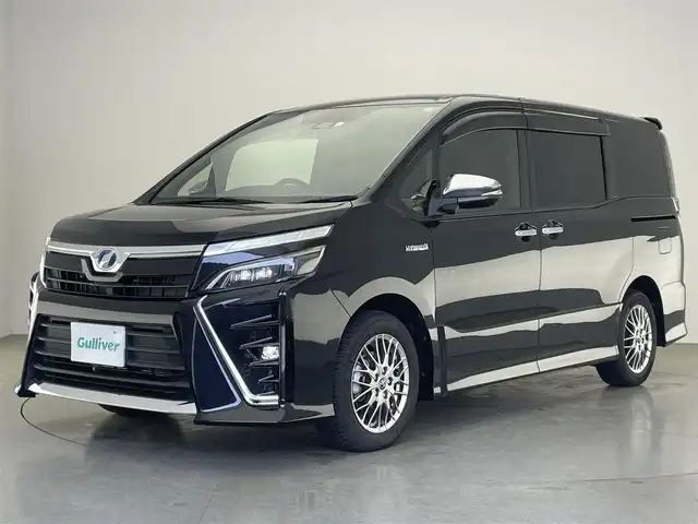 トヨタ ヴォクシー ハイブリッド ZS 煌 愛知県 2018(平30)年 2.6万km ブラック アルパイン１１型ナビ　フルセグＴＶ　ＨＤＭＩ　ＵＳＢ　アルパイン１２．８型後席モニター　シートヒーター　両側パワスラ　コーナーセンサー　セーフティセンス　衝突軽減　クルコン　ＬＥＤオートライト　フォグランプ　禁煙車