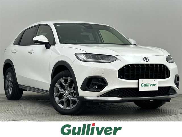 ホンダ ＺＲ－Ｖ ハイブリッド e:HEV X 道央・札幌 2023(令5)年 1.3万km プラチナホワイトパール ・４WD/・コンフォートビューパッケージ/・Honda CONNECT for Gathers＋ナビ装着用スペシャルパッケージ /・CD/DVD/SD/BT/Apple CarPlay/フルセグ/・バックカメラ/・ビルトインETC2.0/・ホンダセンシング/・衝突軽減ブレーキ/・誤発進抑制機能/後方誤発進抑制機能/・路外逸脱抑制機能/・渋滞追従機能付アダプティブクルーズコントロール/・パーキングセンサーシステム/・ヒルディセントコントロール/・オートブレーキホールド/・オートマチックハイビーム/・LEDヘッドライト/・ハーフレザーシート/・前席シートヒーター/・パワーテールゲート（予約クローズ機能付）/・パドルシフト/・純正18インチAW/・純正フロアマット/・プッシュスタート/・スマートキー