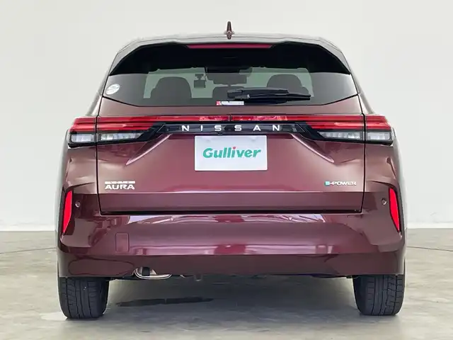 日産 オーラ G レザーエディション 新潟県 2022(令4)年 1.8万km バーガンディー 純正メモリナビ/（BT/FM/AM/フルセグTV）/全周囲カメラ/ステアリングスイッチ/BOSEサウンドスピーカー/デジタルインナーミラー/ブラインドスポットモニター/プロパイロット/置くだけ充電/前方ドライブレコーダー/ウィンカーミラー/電格ミラー/ドアバイザー/ETC2.0/夏タイヤ積載/取扱説明書/保証書