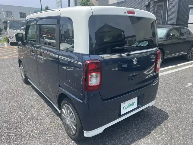 スズキ ワゴンＲ スマイル HYBRID X 長崎県 2023(令5)年 1.1万km インディゴブルーメタリック/ホワイト2トーン ワンオーナー/セーフティサポート/・デュアルカメラブレーキサポート/・誤発進抑制機能/・後退時ブレーキサポート/・後方誤発進抑制機能/・車線逸脱警報機能/・ふらつき警報機能/・先行車発進お知らせ機能/・ハイビームアシスト/純正メモリーナビ/　・フルセグテレビ/　・Bluetooth/   ・ipod/   ・smartphoneLink/   ・CD/全方位モニター/ビルトインETC/社外前後ドライブレコーダー/純正フロント&サイド&リアアンダーガーニッシュ/両側パワースライドドア/純正LEDオートヘッドライト/スマートキー/運転席シートヒーター/リアクリアランスソナー/保証書/取扱説明書