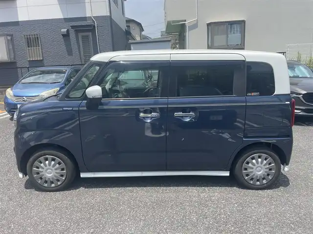 スズキ ワゴンＲ スマイル HYBRID X 長崎県 2023(令5)年 1.1万km インディゴブルーメタリック/ホワイト2トーン ワンオーナー/セーフティサポート/・デュアルカメラブレーキサポート/・誤発進抑制機能/・後退時ブレーキサポート/・後方誤発進抑制機能/・車線逸脱警報機能/・ふらつき警報機能/・先行車発進お知らせ機能/・ハイビームアシスト/純正メモリーナビ/　・フルセグテレビ/　・Bluetooth/   ・ipod/   ・smartphoneLink/   ・CD/全方位モニター/ビルトインETC/社外前後ドライブレコーダー/純正フロント&サイド&リアアンダーガーニッシュ/両側パワースライドドア/純正LEDオートヘッドライト/スマートキー/運転席シートヒーター/リアクリアランスソナー/保証書/取扱説明書