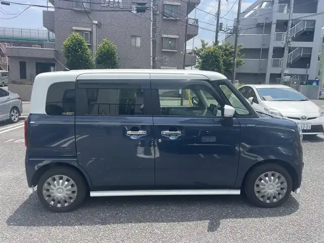 スズキ ワゴンＲ スマイル HYBRID X 長崎県 2023(令5)年 1.1万km インディゴブルーメタリック/ホワイト2トーン ワンオーナー/セーフティサポート/・デュアルカメラブレーキサポート/・誤発進抑制機能/・後退時ブレーキサポート/・後方誤発進抑制機能/・車線逸脱警報機能/・ふらつき警報機能/・先行車発進お知らせ機能/・ハイビームアシスト/純正メモリーナビ/　・フルセグテレビ/　・Bluetooth/   ・ipod/   ・smartphoneLink/   ・CD/全方位モニター/ビルトインETC/社外前後ドライブレコーダー/純正フロント&サイド&リアアンダーガーニッシュ/両側パワースライドドア/純正LEDオートヘッドライト/スマートキー/運転席シートヒーター/リアクリアランスソナー/保証書/取扱説明書