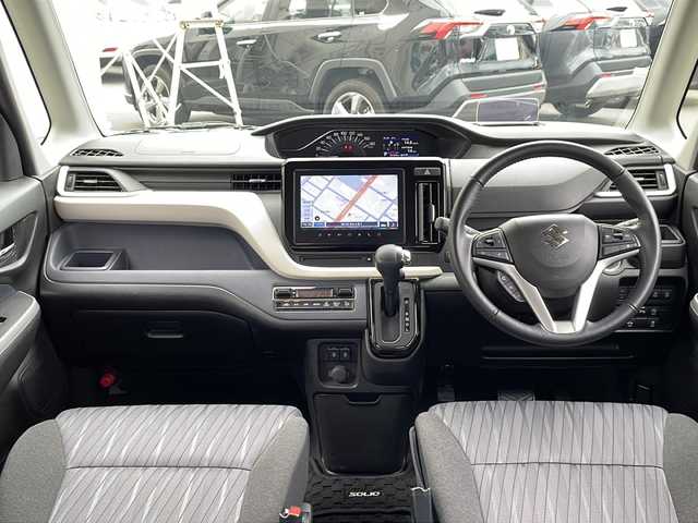 スズキ ソリオ HV MZ 道北・旭川 2021(令3)年 2.5万km ピュアホワイトP ・４ＷＤ/・禁煙車/・両側パワースライドドア/・純正９インチナビ/ＣＤ/ＤＶＤ/ＢＴ/フルセグ/・全方位カメラ/・ステアリングリモコン////デュアルカメラブレーキサポート////・前方衝突警報ブレーキ機能/・前方衝突自動ブレーキ機能/・車線逸脱抑制機能/・踏み間違い防止機能/・ＬＥＤオートライト/・ヘッドアップディスプレイ/・リアサーキュレーター/・ロールサンシェード/・ミラーヒーター/・前席シートヒーター/・ドライブレコーダー/・純正１５インチアルミ/・新車時保証書