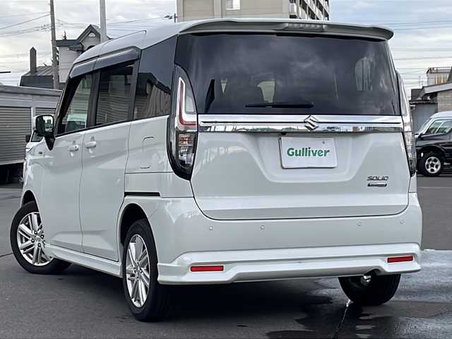 スズキ ソリオ HV MZ 道北・旭川 2021(令3)年 2.5万km ピュアホワイトP ・４ＷＤ/・禁煙車/・両側パワースライドドア/・純正９インチナビ/ＣＤ/ＤＶＤ/ＢＴ/フルセグ/・全方位カメラ/・ステアリングリモコン////デュアルカメラブレーキサポート////・前方衝突警報ブレーキ機能/・前方衝突自動ブレーキ機能/・車線逸脱抑制機能/・踏み間違い防止機能/・ＬＥＤオートライト/・ヘッドアップディスプレイ/・リアサーキュレーター/・ロールサンシェード/・ミラーヒーター/・前席シートヒーター/・ドライブレコーダー/・純正１５インチアルミ/・新車時保証書