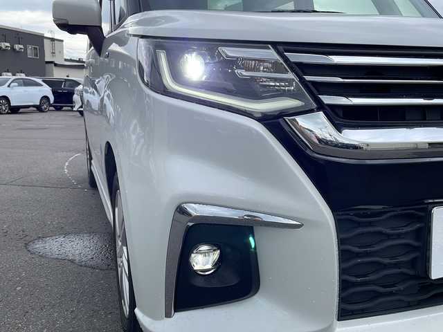スズキ ソリオ HV MZ 道北・旭川 2021(令3)年 2.5万km ピュアホワイトP ・４ＷＤ/・禁煙車/・両側パワースライドドア/・純正９インチナビ/ＣＤ/ＤＶＤ/ＢＴ/フルセグ/・全方位カメラ/・ステアリングリモコン////デュアルカメラブレーキサポート////・前方衝突警報ブレーキ機能/・前方衝突自動ブレーキ機能/・車線逸脱抑制機能/・踏み間違い防止機能/・ＬＥＤオートライト/・ヘッドアップディスプレイ/・リアサーキュレーター/・ロールサンシェード/・ミラーヒーター/・前席シートヒーター/・ドライブレコーダー/・純正１５インチアルミ/・新車時保証書