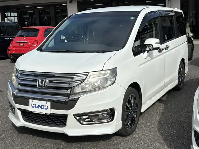 ホンダ ステップワゴン スパーダ Z クールスピリット 埼玉県 2012(平24)年 10.7万km ホワイトオーキッドパール (株)IDOMが運営する【じしゃロン鳩ヶ谷店】の自社ローン専用車両になりますこちらは現金またはオートローンご利用時の価格です。自社ローンご希望の方は別途その旨お申付け下さい/登録時106449km/ハーフレザーシート/両側パワースライドドア/ETC/純正HIDヘッドライト/フォグランプ/１７インチAW/クルーズコントロール/パドルシフト/革巻ステアリング/電動格納機能付きウインカーミラー/ドアバイザー/純正フロアマット/取扱説明書