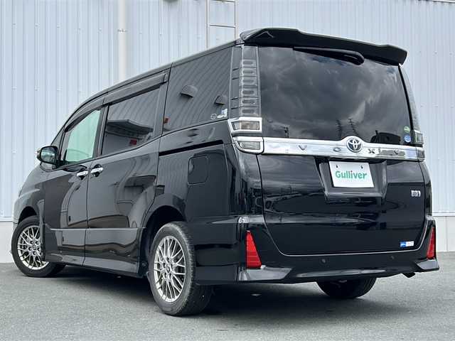 トヨタ ヴォクシー ハイブリッド ZS 煌Ⅱ 三重県 2020(令2)年 2.5万km ブラック 純正10型ナビ /バックカメラ /両側パワースライドドア/ビルトインETC2.0 /GPSレーダー探知機(TZ-R203L) /スペアキー /前席シートヒーター /コーナーセンサー /前後ドライブレコーダー/クルーズコントロール/レーンキープアシスト/衝突軽減ブレーキ/LEDヘッドライト/オートハイビーム /オートライト/革巻きステアリング/ステアリングスイッチ/リヤサンシェード/純正フロアマット /禁煙車