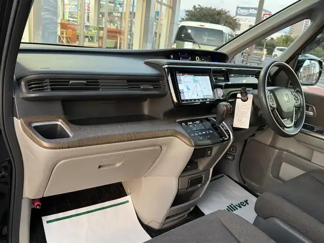 ホンダ ステップワゴン G EX ホンダセンシング 香川県 2018(平30)年 7.8万km クリスタルブラックパール ワンオーナー/純正9インチメモリナビ/フルセグ/CD/DVD/Bluetooth/USB/HondaSENSING/・CMBS（衝突被害軽減ブレーキシステム）/・ACC（アダプティブクルーズコントロール）/・LKAS（車線維持支援システム）/・マルチビューカメラシステム/・LEDオートハイビーム/両側パワースライドドア/3列シート/トリプルゾーンエアコン/前席シートヒーター/シートバックテーブル/ウォークスルー/純正16インチアルミ/純正フロアマット/アイドリングストップ/ETC/プッシュスタート/スマートキー/スペアキー