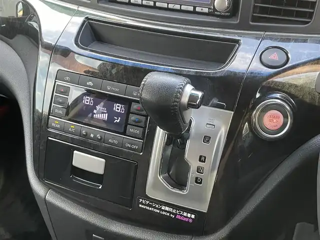 日産 エルグランド ライダー 黒クロス マニュアル 静岡県 2010(平22)年 11.3万km ブリリアントホワイトパール １オーナー　/純正ナビ（HC510D-W）/地デジ　/Bカメラ　/純正後席モニター/両側パワスラ　/木目調パネル　/ハーフレザーシート/ETC　/オートライト　/オーテック18インチAW　/ウィンカーミラー　/スマートキー　/スペアキー　/保証書　/取説