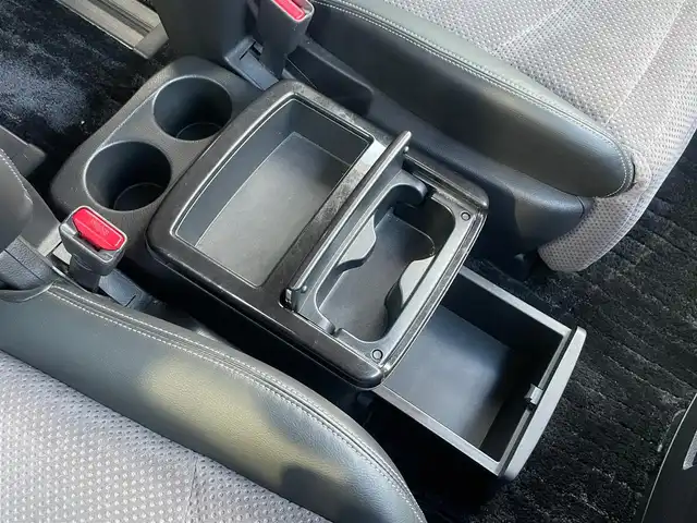 日産 エルグランド ライダー 黒クロス マニュアル 静岡県 2010(平22)年 11.3万km ブリリアントホワイトパール １オーナー　/純正ナビ（HC510D-W）/地デジ　/Bカメラ　/純正後席モニター/両側パワスラ　/木目調パネル　/ハーフレザーシート/ETC　/オートライト　/オーテック18インチAW　/ウィンカーミラー　/スマートキー　/スペアキー　/保証書　/取説