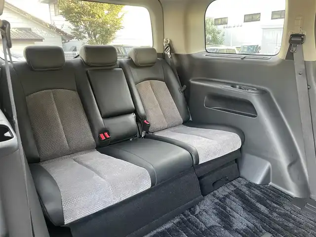 日産 エルグランド ライダー 黒クロス マニュアル 静岡県 2010(平22)年 11.3万km ブリリアントホワイトパール １オーナー　/純正ナビ（HC510D-W）/地デジ　/Bカメラ　/純正後席モニター/両側パワスラ　/木目調パネル　/ハーフレザーシート/ETC　/オートライト　/オーテック18インチAW　/ウィンカーミラー　/スマートキー　/スペアキー　/保証書　/取説