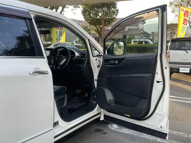 日産 エルグランド ライダー 黒クロス マニュアル 静岡県 2010(平22)年 11.3万km ブリリアントホワイトパール １オーナー　/純正ナビ（HC510D-W）/地デジ　/Bカメラ　/純正後席モニター/両側パワスラ　/木目調パネル　/ハーフレザーシート/ETC　/オートライト　/オーテック18インチAW　/ウィンカーミラー　/スマートキー　/スペアキー　/保証書　/取説